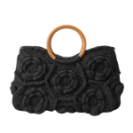 حقيبة يد كروشية باللون الأسود مطرزة بالزهور